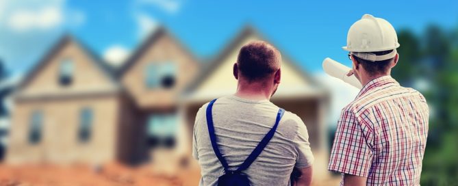 Contractors looking at house