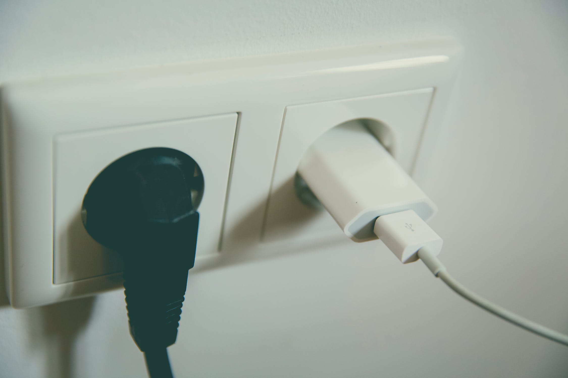 Cords plugged into wall outlet