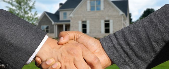 two people shaking hands