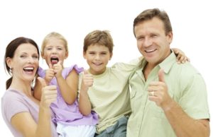 Family giving thumbs up