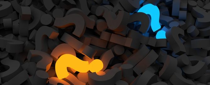 pile of question marks, one glowing blue, and one glowing orange