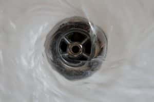 Water down a drain