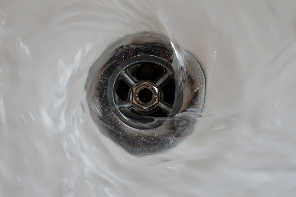 Water down a drain