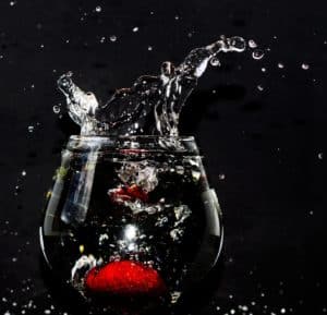 Water splashing out of a glass