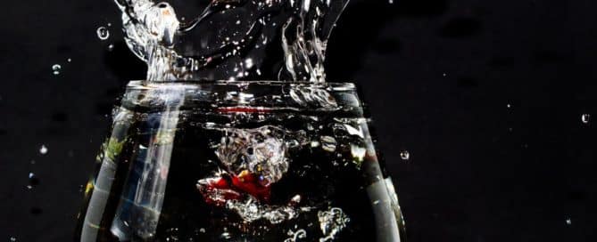 Water splashing out of a glass