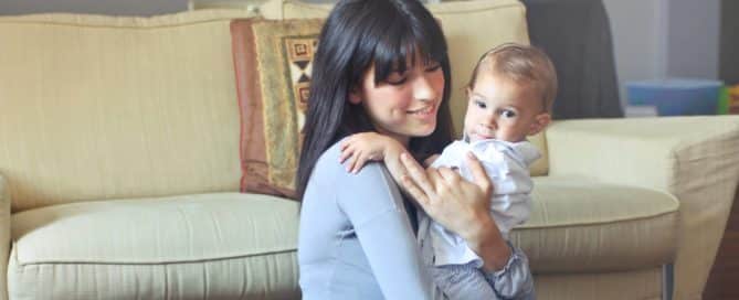 woman holding toddler