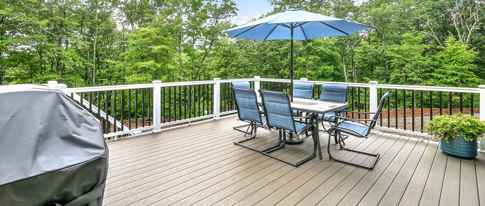 Wooden deck with a table and seating