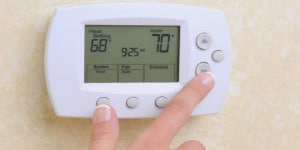 adjusting a thermostat